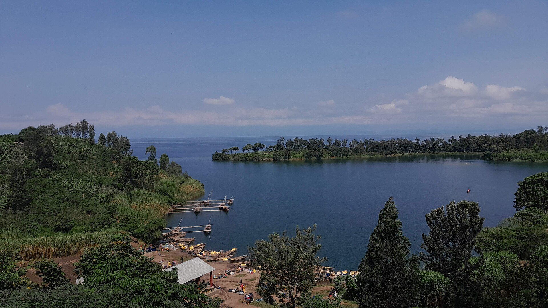 Green shore and hills across Lake Kivu in western Rwanda.